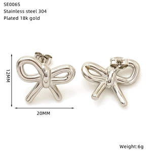 Detail view of 20mm silver bow earrings with 18k gold plating and sizing specifications