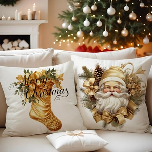 Detailed view of beige Christmas pillow covers with gold festive prints and Merry Christmas text