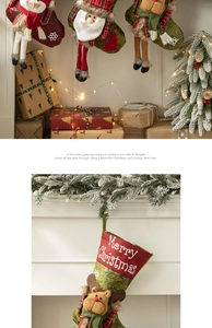 Close-up of a festive Christmas stocking featuring a 3D reindeer design on a fireplace mantel