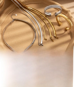 Macro shot of titanium steel snake bone chain with premium vacuum plating in gold and silver