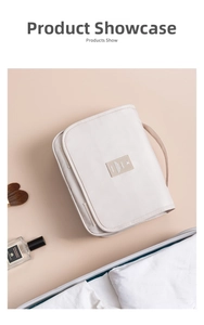 Detail of premium beige travel toiletry bag with waterproof nylon texture and hanging handle