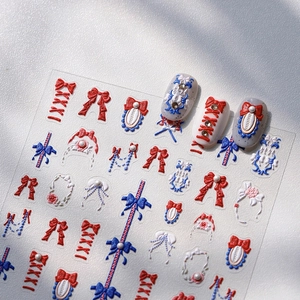 3D embossed nail stickers featuring vintage red and blue bows with pearl accents