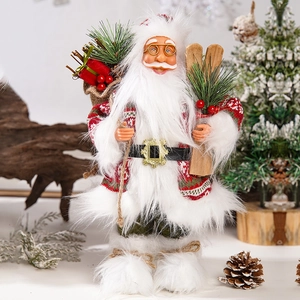 Close-up of Santa Claus doll with knitted sweater, wooden skis, and pine cone details