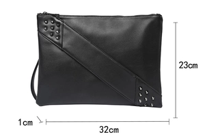 Flat lay detail of black PU leather clutch with silver studs and 32x23cm dimensions