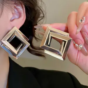 Polished silver geometric square earrings in a layered hollow design for women