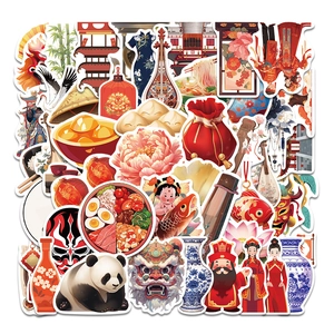 Close-up of Chinese traditional stickers featuring pandas, lanterns and blue porcelain