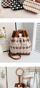 Detailed view of knitted drawstring bucket bags with checkered patterns and sliders