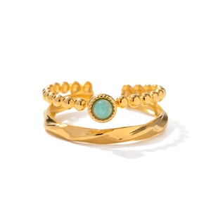 French vintage gold ring set with turquoise gemstone and twisted minimalist bands