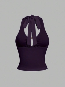 Slim fit dark purple halter neck crop top with ribbed texture and front cutout detail