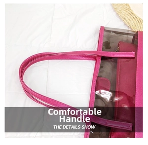 Detail of comfortable pink PU handles and reinforced stitching on clear PVC tote bag