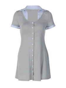 Detail of grey knit dress showing blue striped collar and white button-up front