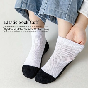 Kids breathable mesh ankle socks with black contrast toe and elastic cuffs in white