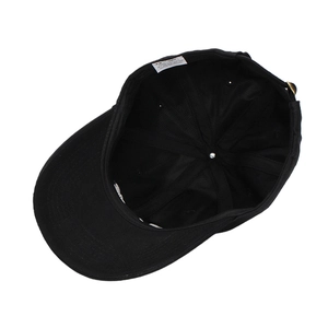 Interior view of black cotton baseball cap showing lining and care label details