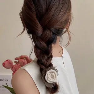 Elegant fabric rose hair tie in cream and coffee tones for vintage braid hairstyles