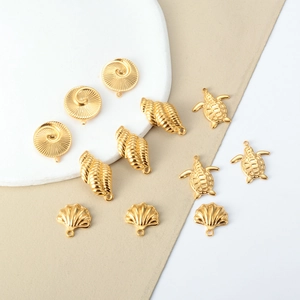 Golden stainless steel ocean pendants set featuring shells and sea turtles for DIY jewelry