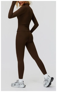 Detail showing high waist dark brown leggings and long sleeve top side rear view