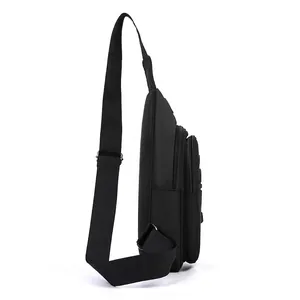 Black water-resistant Oxford sling bag for men with multiple zipper compartments and adjustable strap