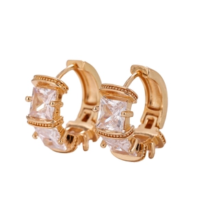 Gold C-shaped hoop earrings with micro-paved square zircons on a white background