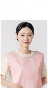 Pink heart print apron with round neck design and breathable white mesh back detail
