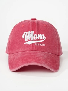 Detail of Mom EST 2026 white embroidery on vintage washed red cotton baseball cap