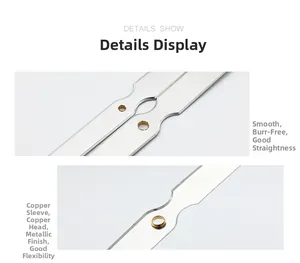 Detailed macro view of smooth silver aluminum clock hands with copper bushings