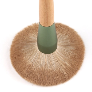 Large loose powder brush with wooden handle and green ferrule for flawless makeup