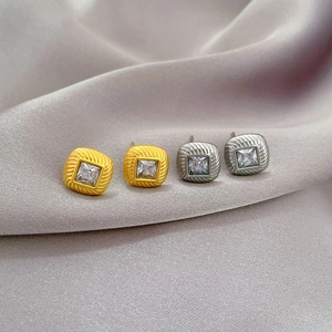 Minimalist square zircon titanium steel earrings in gold and silver on purple silk