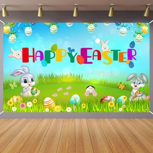 Detail of Happy Easter banner featuring cartoon bunnies and colorful eggs on white wall