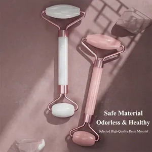Double-headed resin facial massager roller with rose gold frame for skin care