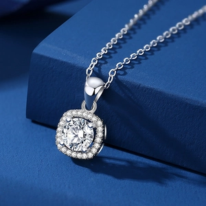 Elegant S925 silver square necklace with round brilliant moissanite pendant on blue background