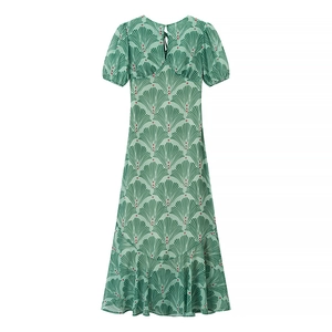 Green fan-print midi dress with red dots, short puff sleeves, and lace-up V-neckline