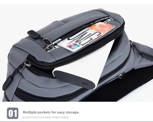 Close-up of waterproof grey chest bag showing multiple pockets and storage capacity