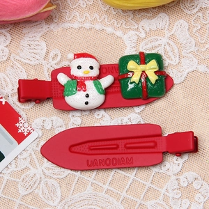 Christmas snowman and gift box hair clip set on white lace with festive red colors