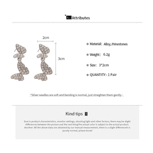 Detailed size chart for rhinestone butterfly tassel earrings with alloy material specs