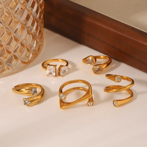 Detail of 18K gold plated stainless steel ring set featuring sparkling zircon stones