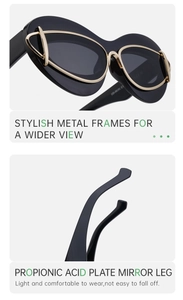 Detail of cat eye sunglasses showing black frames with gold metal accents and sleek temples