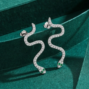 S925 sterling silver snake stud earrings with white crystals and green gemstone eyes