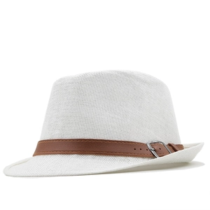 Close-up of white woven fedora hat featuring a brown faux leather band and metal buckle
