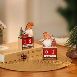 Macro detail of wooden Christmas gnome advent calendars with manual date blocks on a table