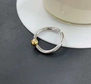 Minimalist S925 sterling silver open ring featuring a polished band with a gold bead accent