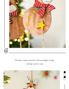 Close-up of wooden Christmas elk and snowman ornaments with red striped scarves