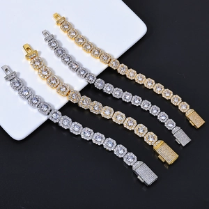 Close-up of four luxury hip hop bracelets in gold and silver finish with full zircon inlay
