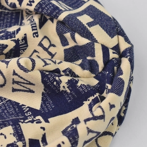 Cream knit slouchy beanie with vintage navy newspaper print for men and women