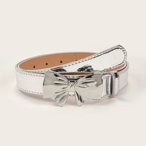 Minimalist silver mirror finish belt with large metallic bow buckle for women jeans