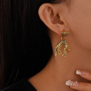 Vintage golden leopard dangle earrings for women featuring wild animal spot details