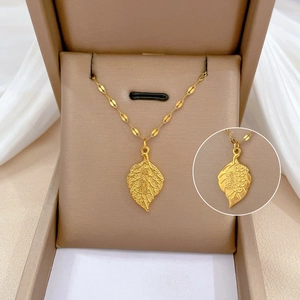 Gold leaf pendant titanium steel necklace with lucky engravings in a gift box