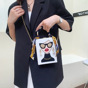 Women's chic box bag with face illustration, pearl earring detail and silk scarf handle