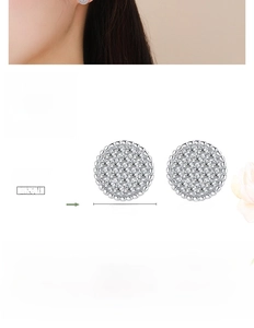 Detail view of 9.8mm round S925 sterling silver stud earrings with zirconia stones