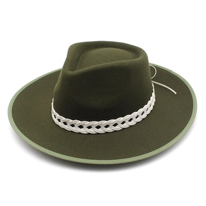 Detail of wool fedora hat with white woven bow band and olive green textured felt brim