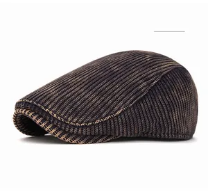 Detailed close-up of retro tie-dye knit newsboy cap showing vintage texture and stitching